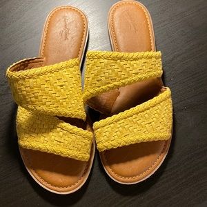 Yellow woven sandals